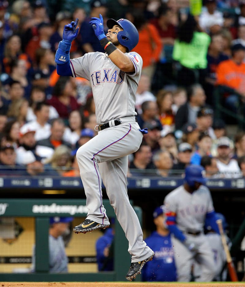 Colon perfect into 8th, Rangers beat Astros 3-1 in 10